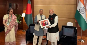 মোদিকে আলোকচিত্র উপহার দিলেন ড. ইউনূস