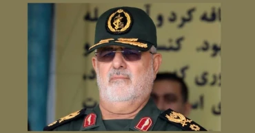 Iran says ‘finger on trigger’ as Trump claims Tehran wants talks