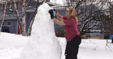 Winter storms dump snow and ice across New England