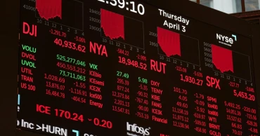 Asian stocks tumble following Wall Street drop on Trump tariffs