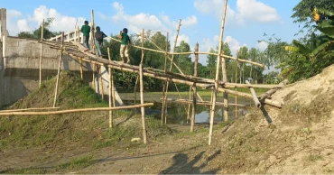 Concrete bridge costing Tk 69 lakh with no approach road in Lalmonirhat