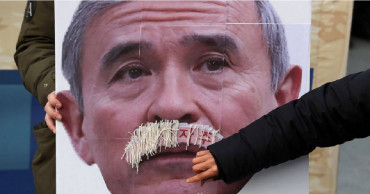 US envoy say it's his mustache; South Koreans say otherwise