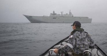 Australian crews race to contain blazes as damage bill soars