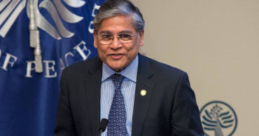 Ambassador Ziauddin distributes Thanksgiving turkeys among homeless in Kansas