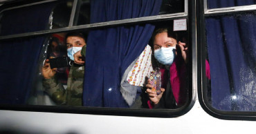 Ukraine's PM warns protests of China evacuees may resume