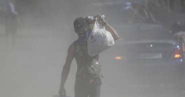 Philippine volcano's quakes, cracks send more people fleeing