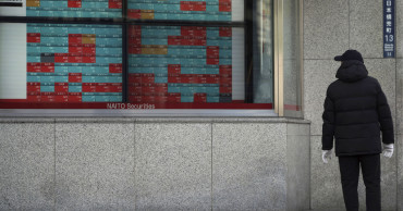 Asian shares take hit as new virus cases jump outside China