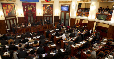 Bolivian interim leader proposes new elections as toll rises