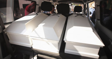 Family receives remains of 6 killed in El Salvador massacre