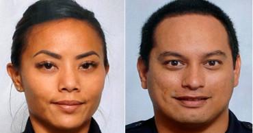 Shooting kills 2 officers before Hawaii homes catch fire