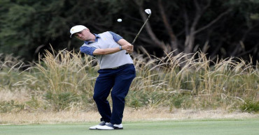 Woods sits as International expands Presidents Cup lead