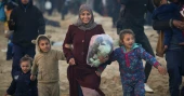 Thousands of Palestinians return to a shattered northern Gaza