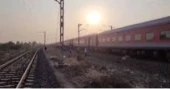 12 rail passengers killed in India after jumping onto tracks in fire panic