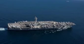 Trump warns Iran as US naval fleet builds up in Gulf