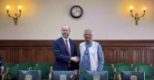 British Business Secretary Jonathan Reynolds meets Prof Yunus