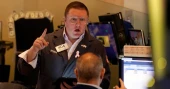 Wall Street rises as report reveals inflation slowdown