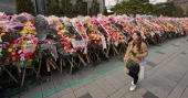 SKoreans turn funeral wreaths, K-pop light sticks into political protest tools