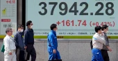 Asian markets rise modestly after Wall Street’s slow session