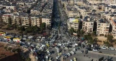 Tens of thousands flee Aleppo amid Syrian-Kurdish clashes