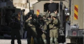 Israeli forces raid West Bank foreign exchange shops; one killed, dozens injured