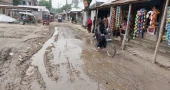 Kurigram road in dire condition, as even light rainfall renders it unusable