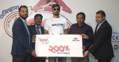Mashrafe hands over cash voucher to Walton fridge customer